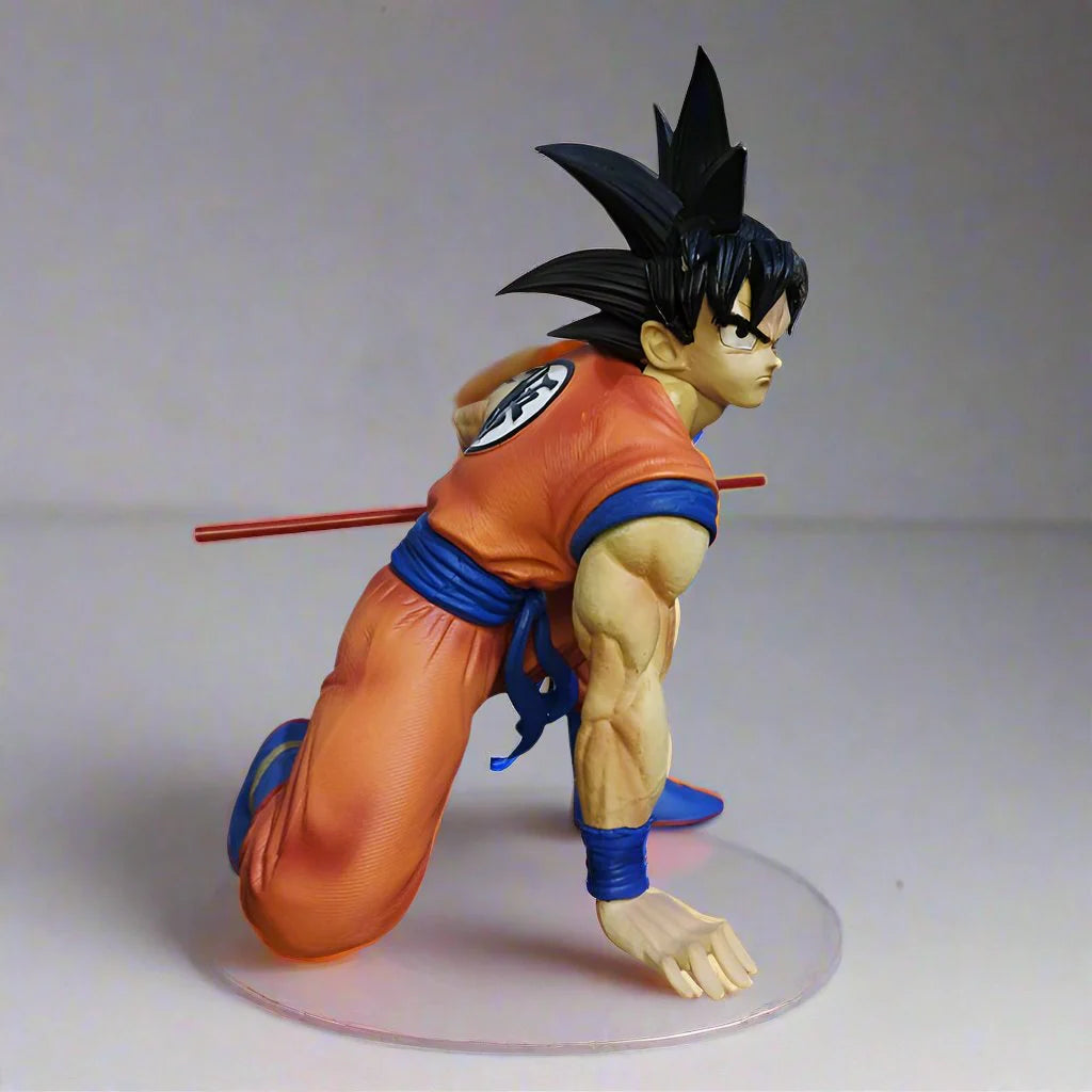 Son Goku sitting with Stick Action Figure - Dragon Ball Z