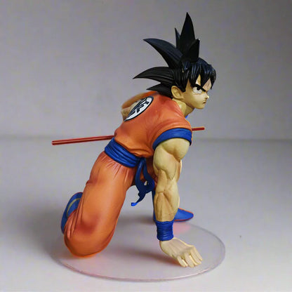 Son Goku sitting with Stick Action Figure - Dragon Ball Z