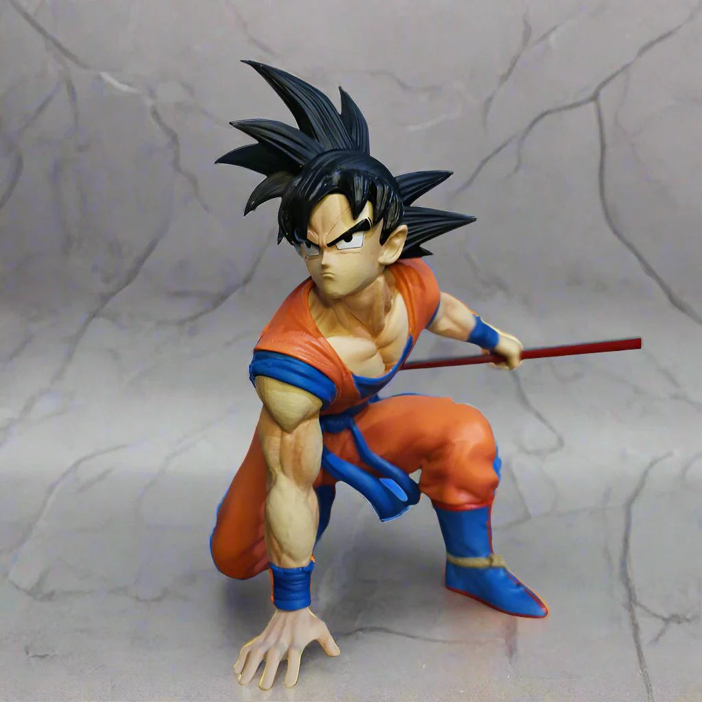 Son Goku sitting with Stick Action Figure - Dragon Ball Z