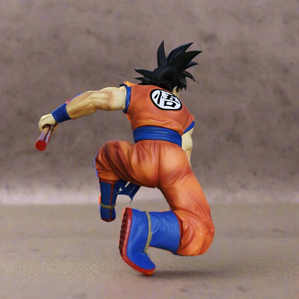 Son Goku sitting with Stick Action Figure - Dragon Ball Z