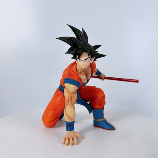 Son Goku sitting with Stick Action Figure - Dragon Ball Z